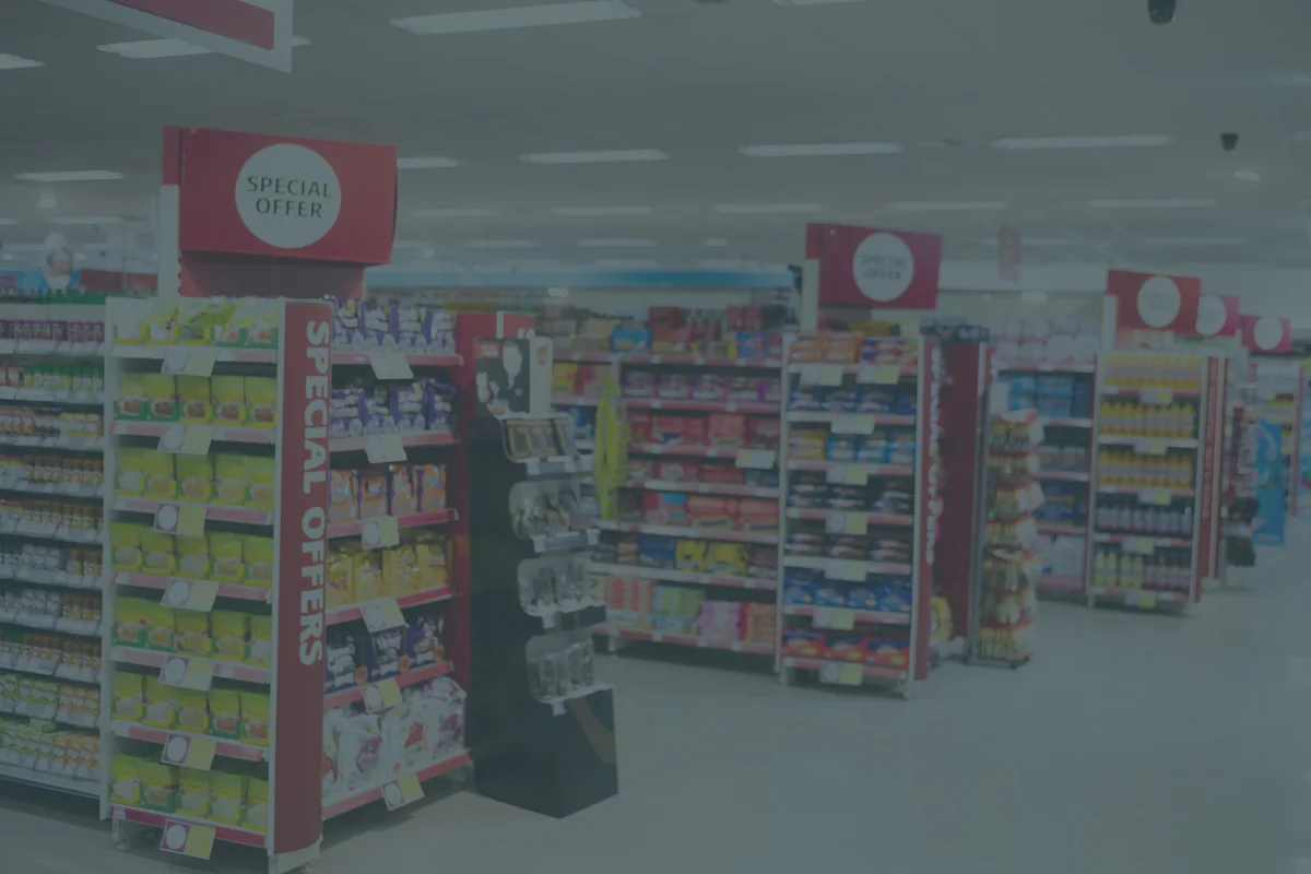 Promotional display of products at the end of a supermarket aisle